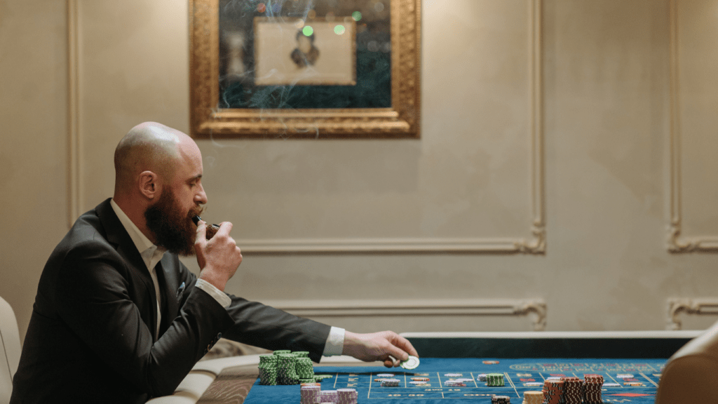 A man playing roulette in a casino