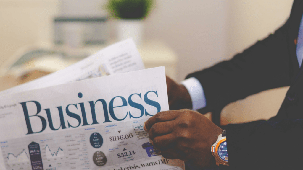 Person holding a white business paper