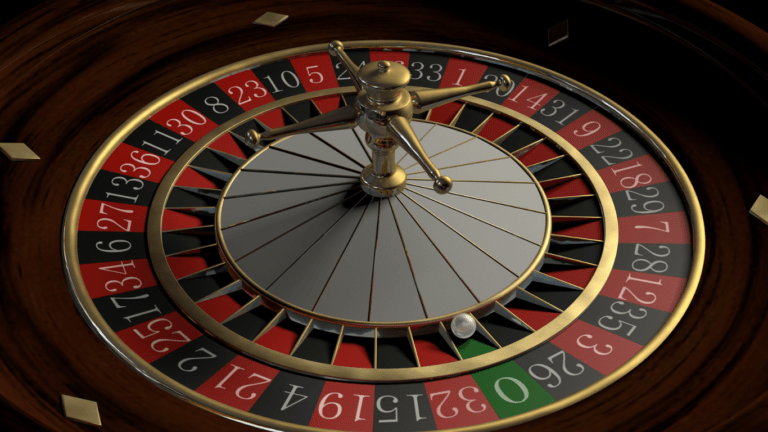 a close up of a roulette wheel on a casino table